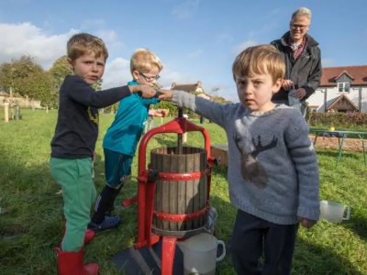 Pressing Apple Pulp with Child Labour!