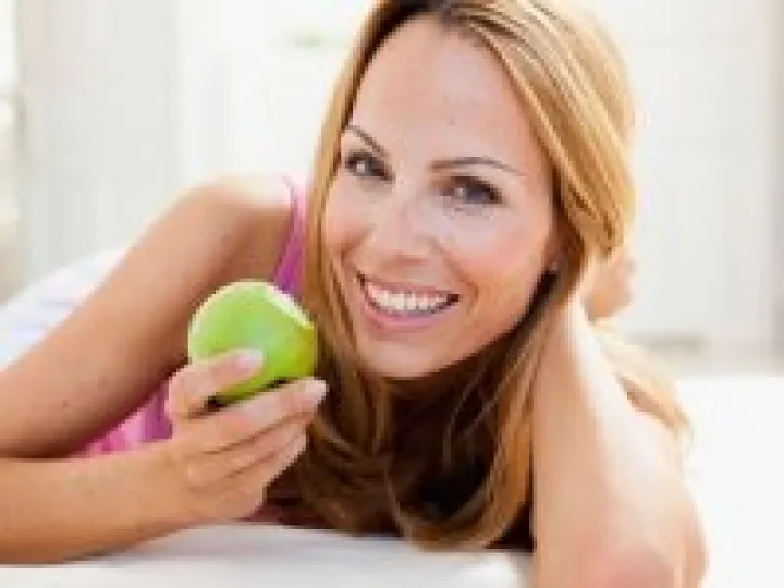Woman eating fruit 02