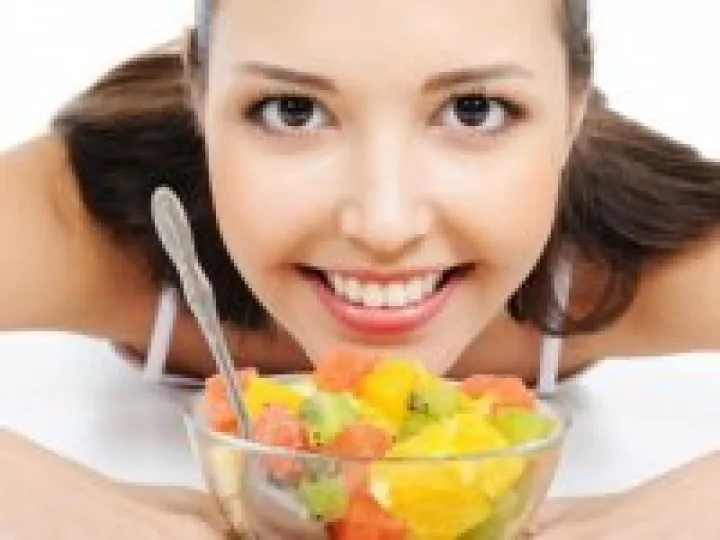 Woman eating fruit 03