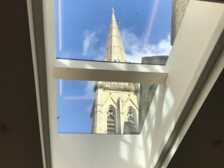 Spire through skylights