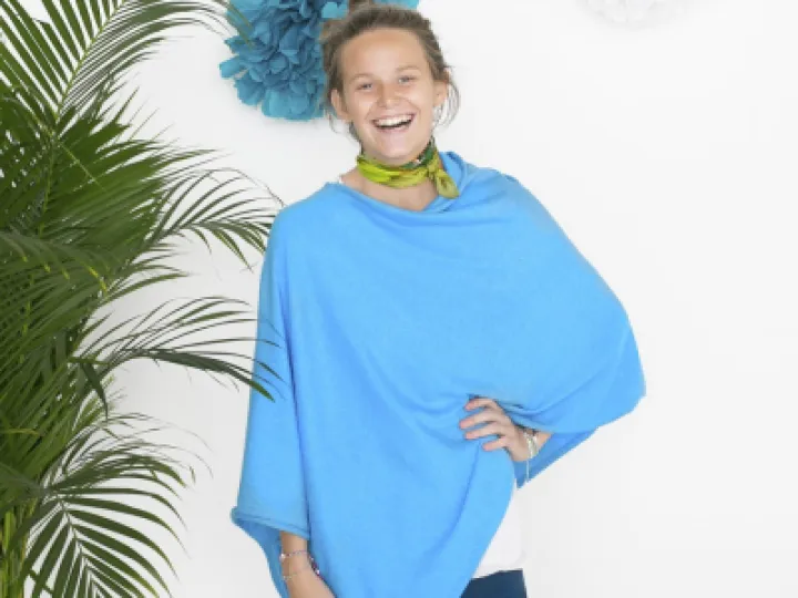 Tilley poncho peacock