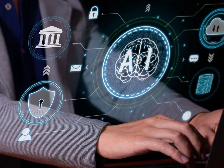 AI and banking technology illustration showing hands on a computer with bank and cloud security icons.